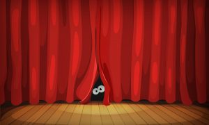Frightened Eyes Behind Red Curtains On Wood Stage